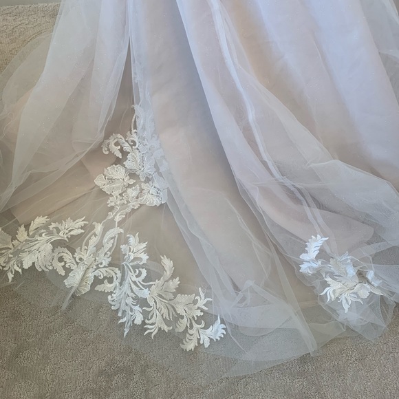 Worn once!!! This beautiful Stella York gown is perfect. - Picture 3 of 4